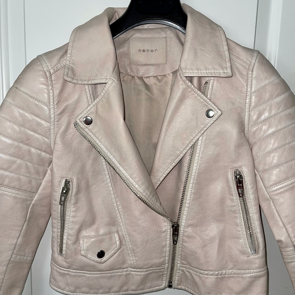 Super cool and trendy BLANK NYC moto motorcycle jacket. Pale pink
